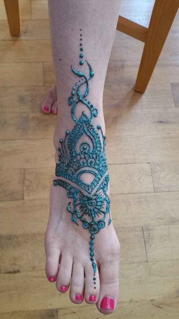 Traditional bridal henna pattern on a hand and wrist